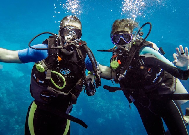 Nicole and Michael learning to scuba dive in Cozumel.