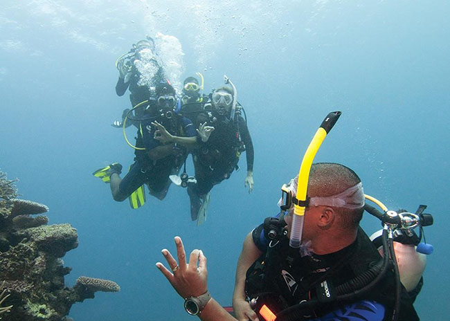 David with his scuba diving instructor in Cozumel.